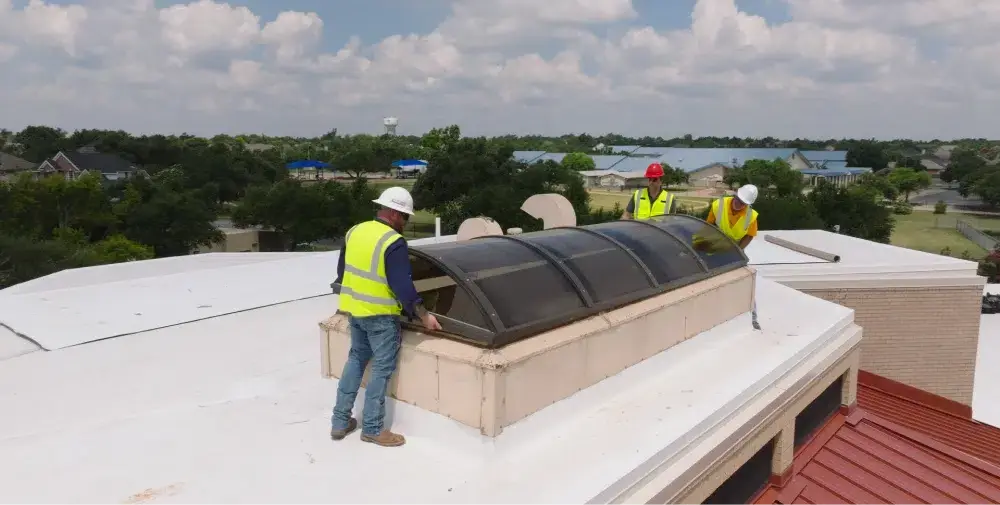 Ark crew installing a skylight on a Pflugerville commercial roof