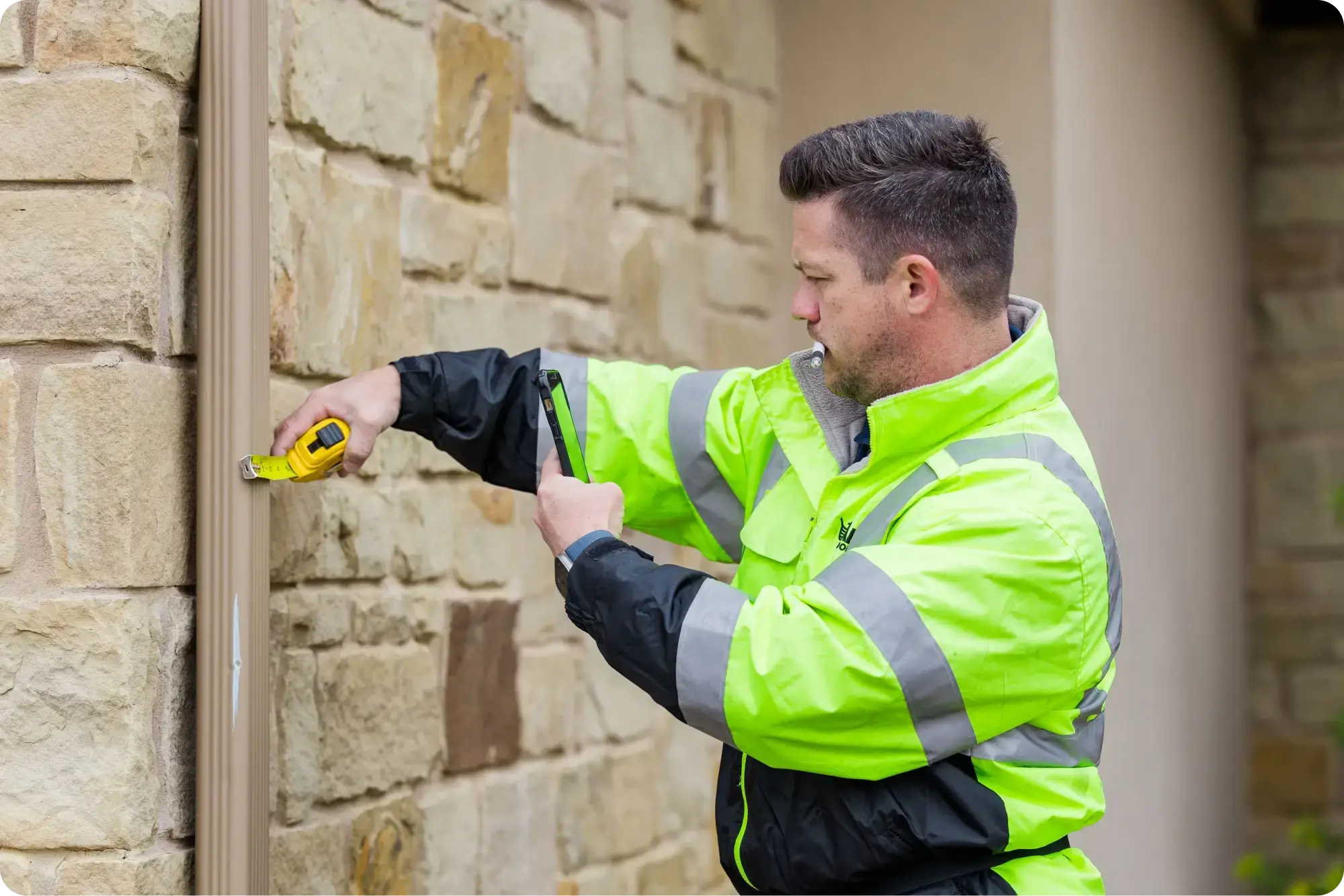 Roofer reviewing a roof replacement estimate