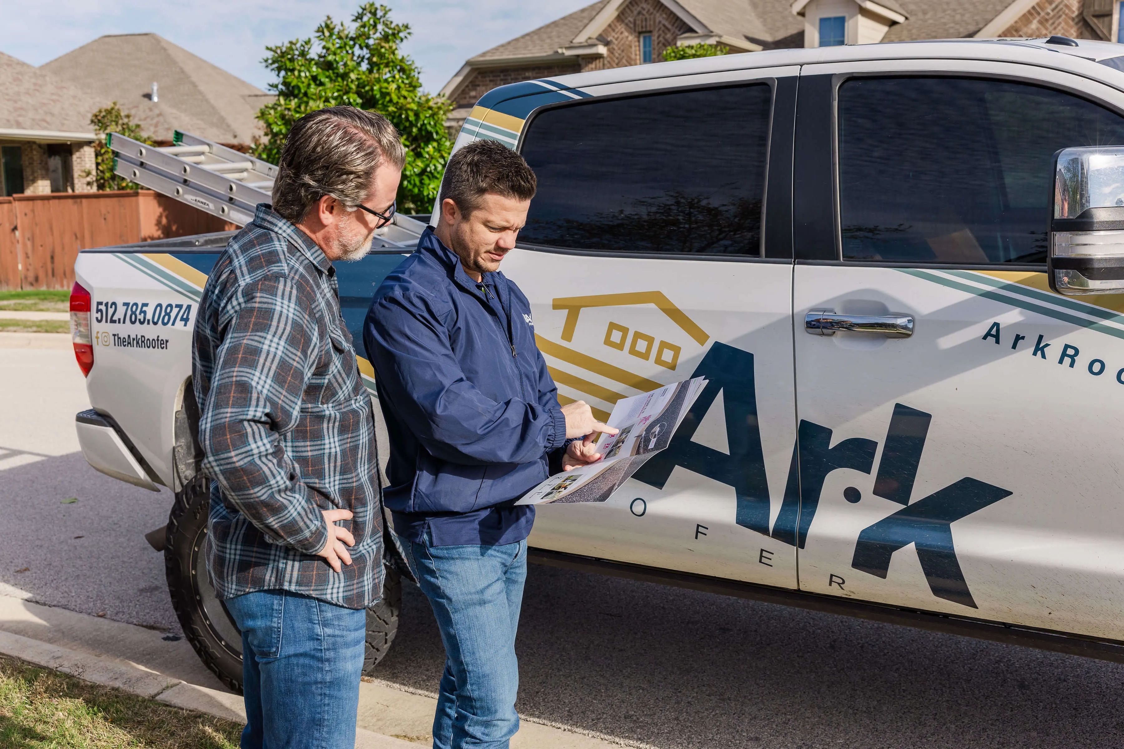Ark consultant reviewing the storm damage evidence report with a homeowner
