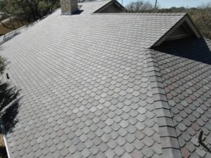 A new roof with gray, slate-like shingles.