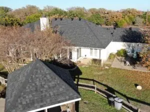 Black roofs on house and gazebo