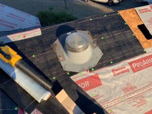 Sun tunnel flashing on new roof