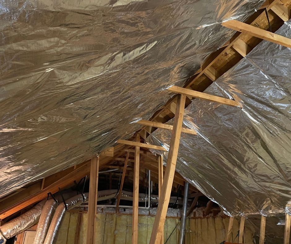 Insulated attic with reflective foil.