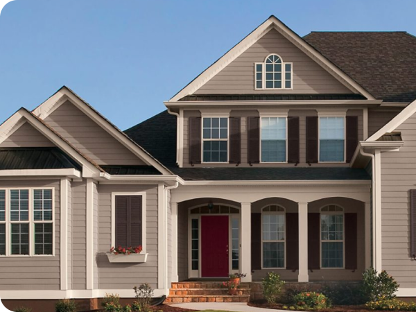 A modern home featuring large windows.