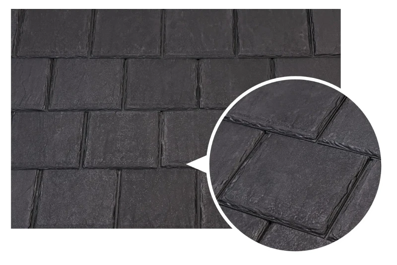 Close-up of dark slate roof tiles with a textured finish and detailed inset of tile pattern