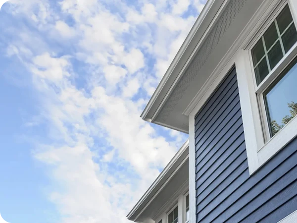 Close-up of a residential roof with asphalt shingles.