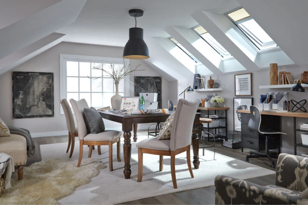 Inside of a room with furniture and skylight