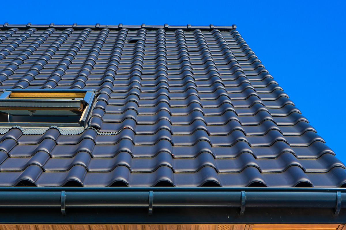 Clean tile roof with skylight.